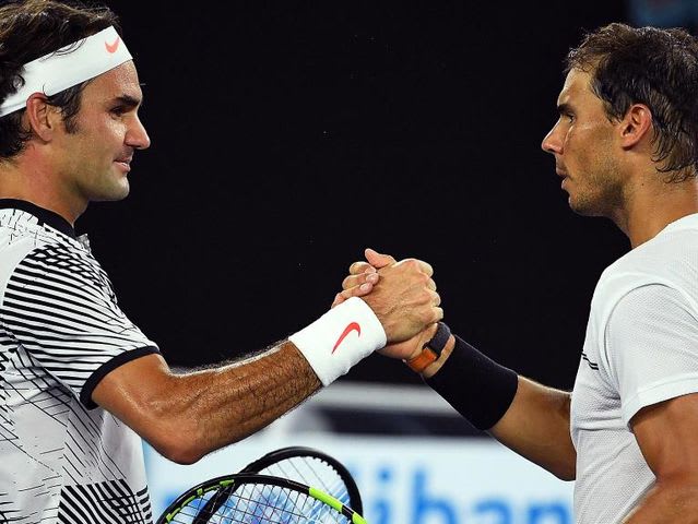 At which Grand Slam final did Roger Federer and Rafael Nadal first meet?