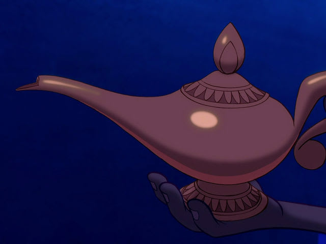 man rubbing genie lamp aladdin