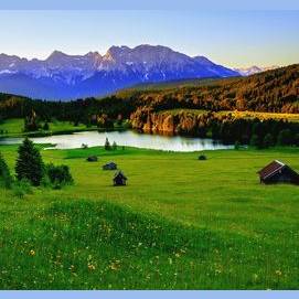 In a cabin in a meadow with a wonderful view.
