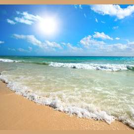 By the beach. 