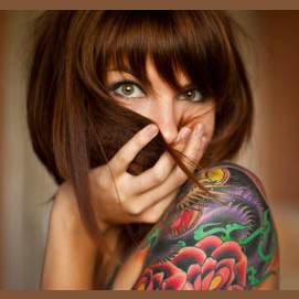 Ich würde mir eine neue Frisur oder ein Tattoo machen lassen.