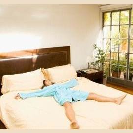 Sprawled across the bed