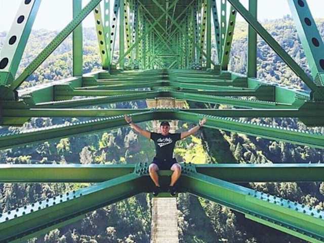 She's posing on the Foresthill Bridge