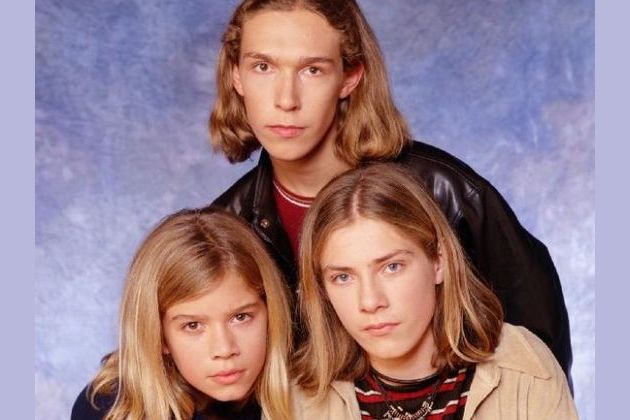 Nineties pop band Hanson look unrecognisable as dashing grown-up stars