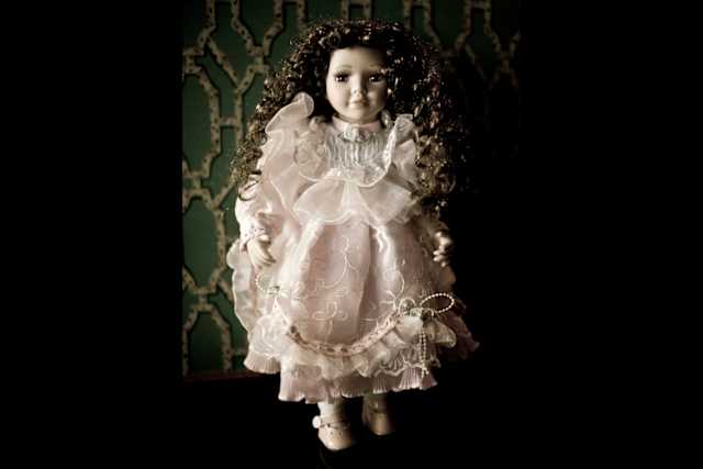 At first glance, this doll is cute...charming, even. But there's something in the expression. A sadness that just couldn't be conveyed with a pair of glass eyes. Could it? Maybe there's a real person in there. Trapped. Her screams of anguish forever silenced by her porcelain tomb. 