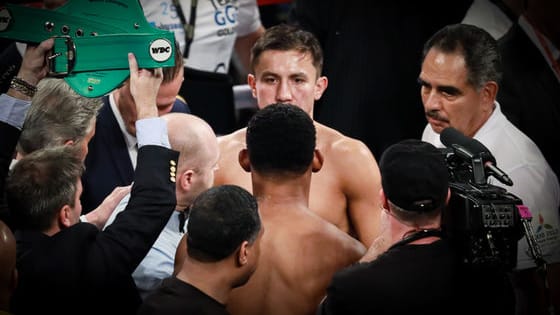 After 12 hard-fought rounds, Gennady Golovkin edged Daniel Jacobs by a close unanimous decision.