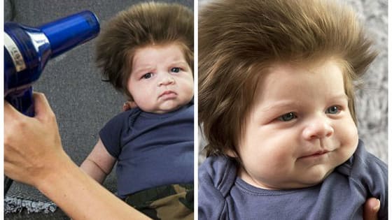 Junior Cox-Noon is only nine weeks old, but his hair is so long his mom has to blow-dry it every night. Would you cut your baby's hair or style it every day?