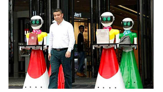 He has an entourage of eight robot shoppers.