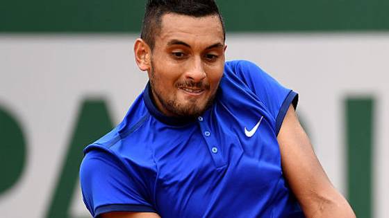 Nick Kyrgios advanced to the second round of Roland Garros but not without losing his temper against the umpire for a warning for unsporting conduct