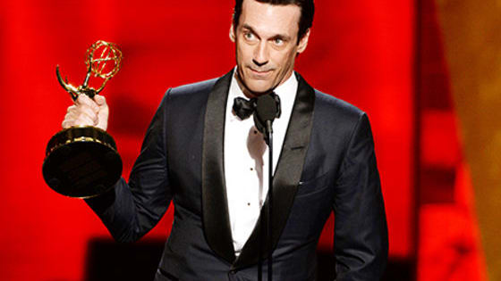 Hamm's Emmy for playing the infamous Don Draper has been long anticipated... he literally climbed on stage to accept his award. 