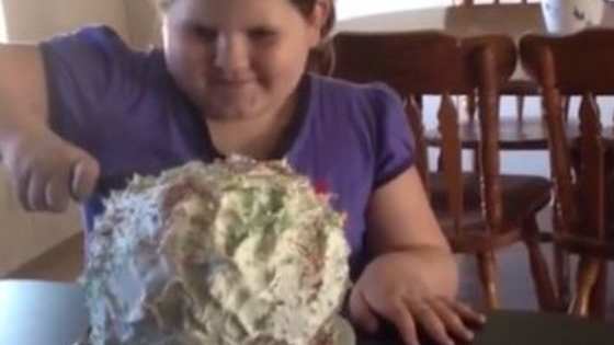 This girl will never eat cake again...