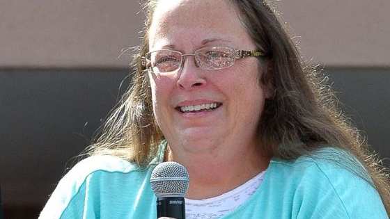 Kim Davis, a Kentucky county clerk, refused to issue marriage licenses to gay couples on the grounds of her religious beliefs and was put in jail for 5 days. In response, Planting Peace, a gay rights group erected this billboard in her hometown. 