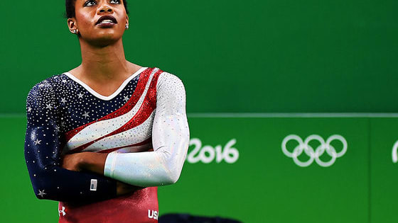 The Olympic Gold Medalist was widely criticized for not putting her hand over her heart during the National Anthem portion of the medal ceremony