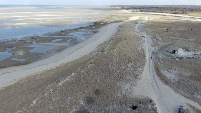 If state officials have their way, off-road-vehicles at Crowes Pasture in Dennis could soon be banned from driving or parking on exposed tidal flats, which have been popular with ORV drivers for decades. Tell us what you think below.