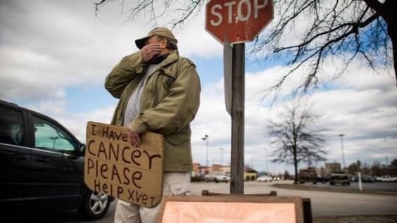 The City Council will consider regulations that would fine vehicle occupants for giving money and other items to panhandlers on public roadways.
