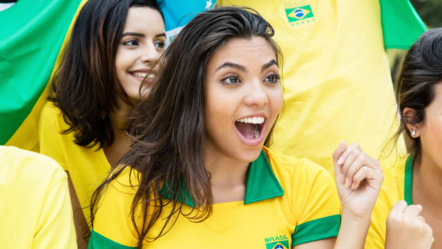 Take a look at these sexy soccer supporters and see if you can tell which team they root for at the FIFA World Cup