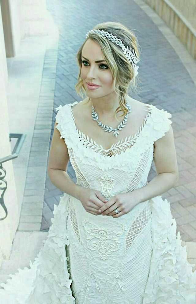 This gown, the winner of the 2017 Toilet Paper Wedding Dress Contest, features fairy-tale netting all over, including a stunning back and unbelievably detailed toilet paper embroidery details. Leaves are used in multiple areas to give a natural wonder to the gown and it includes an enormous train made entirely of toilet paper butterflies. It's easy to see how this stunner took the grand prize.