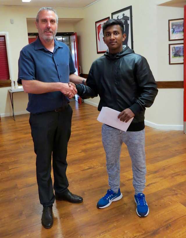 Head teacher David Bailey with Rubel Miah