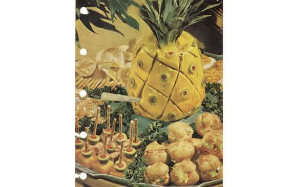 This may look like a pineapple, but underneath is a loaf of liver and sausage mixed with mayonnaise, lemon juice and Worcestershire sauce, set into a pineapple jelly mold and then iced with sugary yellow icing. Some people have described this to be the worst recipe ever and they would be right. The sugary icing off set with the savoury, salty liver is not so pleasant.  