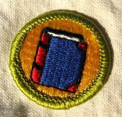 This boy scout badge was available until 1987. They apparently knew that print media was on its way out even then.