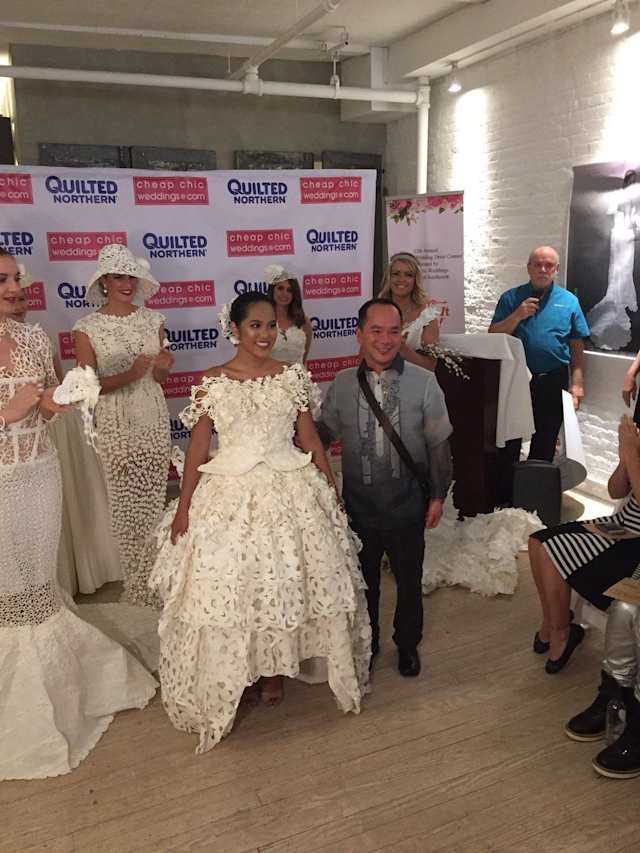 Roy Cruz submitted this unique tea-length high-low gown that combines modern design with traditional Latin-American flare using dozens of layers of toilet paper.
