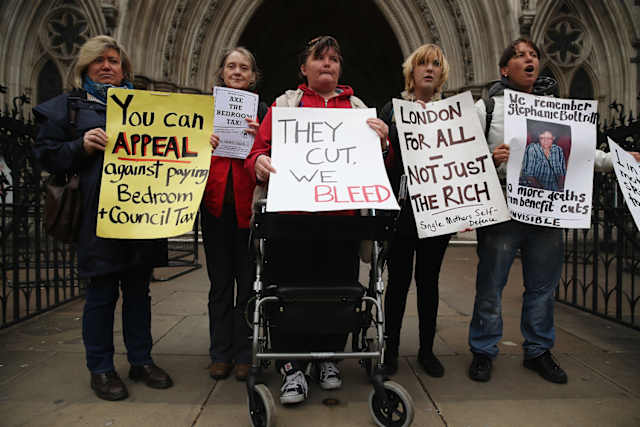Campaigners protest against Tory welfare policies. Photo: Getty Images.
