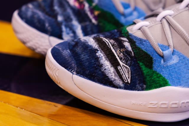 Mercury rookie Sophie Cunningham's custom Hyperdunks honor all of the women in her family and her childhood growing up in Columbia, Missouri. A lake scene featuring the Cunninghams' nearby dock, jet skis and boat reminds Cunningham of her family's favorite memories. The names and nicknames Maggie, Lindsey, Stacey, Mom and Mama can be seen wrapping around the shoe’s collar in the clouds of the lake.